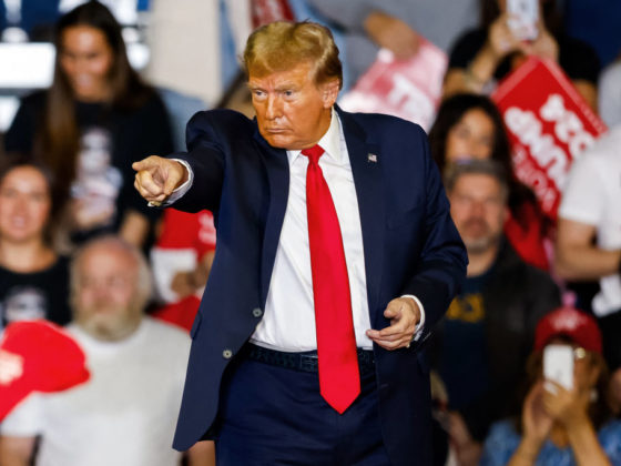 TOPSHOT - Former US President and 2024 presidential hopeful Donald Trump attends a "Get Out the Vote" Rally in Conway, South Carolina, on February 10, 2024. (Photo by Julia Nikhinson / AFP) / ALTERNATE CROP (Photo by JULIA NIKHINSON/AFP via Getty Images)