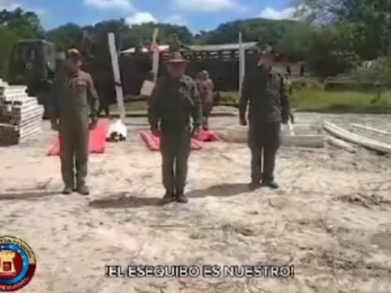 In one scene from a video posted to social media by the Venezuelan National Guard, soldiers stand at attention near construction supplies while subtitles declare, "El Esequibo es nuestro! (Essquibo is ours!)"