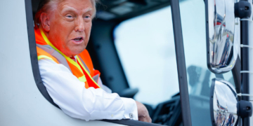 Photos: Trump Rides in MAGA Garbage Truck in Wisconsin