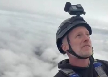 Brendan Carr Climbs Above The Clouds To Celebrate One Of Scariest, Hardest Jobs In World