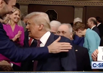 Republican Snatches Dem Rep’s ‘This is Not Normal’ Sign and Throws It As Trump Walks in
