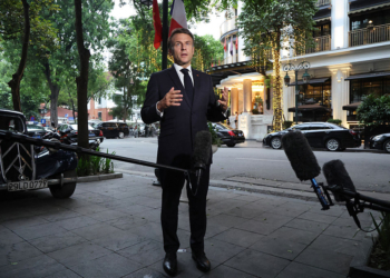Macron’s Team Says Viral Video of Wife Seeming to Shove Him ‘Playful Teasing’