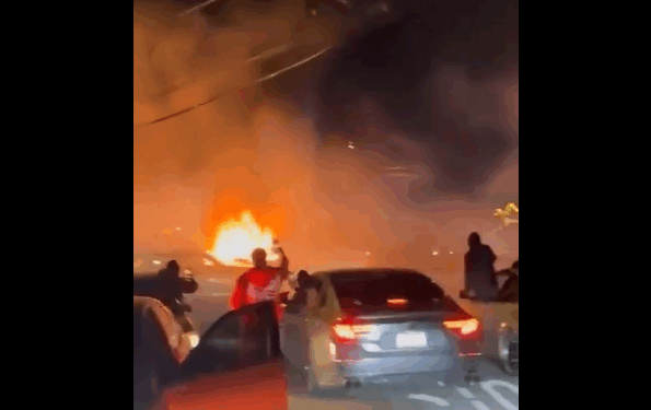 Watch: Queens Street Takeover Turns Violent, Couple Beaten and Car Set Ablaze