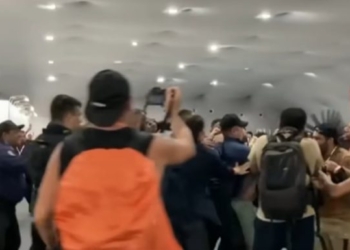 Feather-Headed Protesters Storm Elite Climate Summit In Chaotic Scene