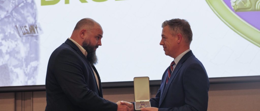 Sen Banks Pins Long-Deserved Purple Heart On Iraq Veteran After Nearly Two Decades