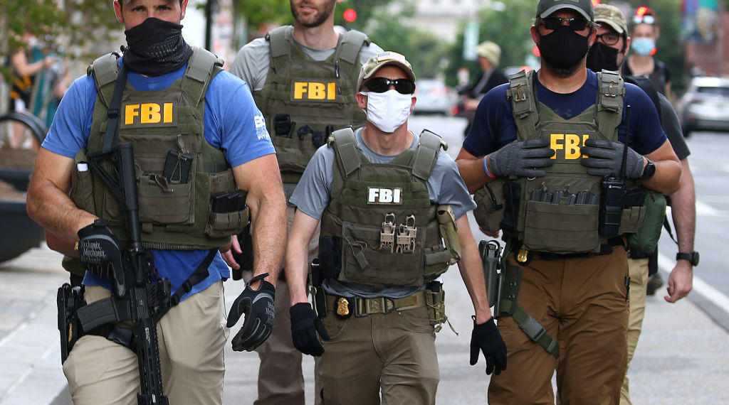 Fired FBI Agents Say Kneeling Was Tactical, Not Political, Sue to Get Jobs Back