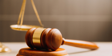 Fraudster’s Murder Trial Opens With Conflicting Accounts of Wife’s Death