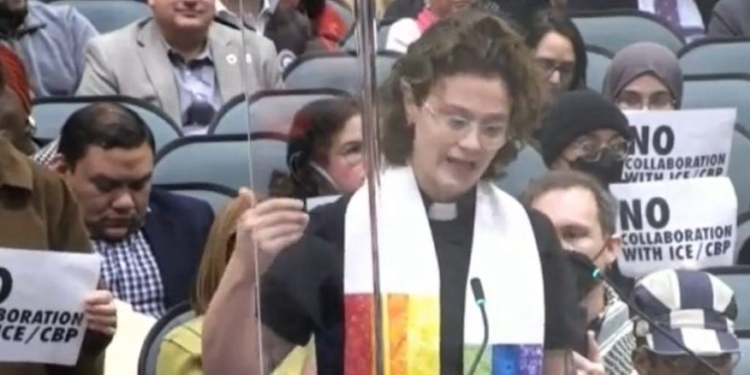 Rainbow-Clad Female Reverend Compares ICE Supporters To Judas