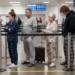 Travelers Wear Pajamas To The Airport To Protest Request