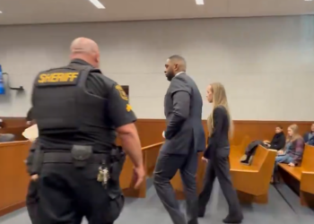 Ex-Michigan Coach Sherrone Moore Smiles in Court as Wife Looks On Amid Felony Case