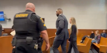 Ex-Michigan Coach Sherrone Moore Smiles in Court as Wife Looks On Amid Felony Case