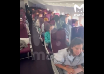 Feet Up at 30,000 Feet: Plane Passenger Sparks Midair Meltdown