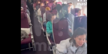 Feet Up at 30,000 Feet: Plane Passenger Sparks Midair Meltdown
