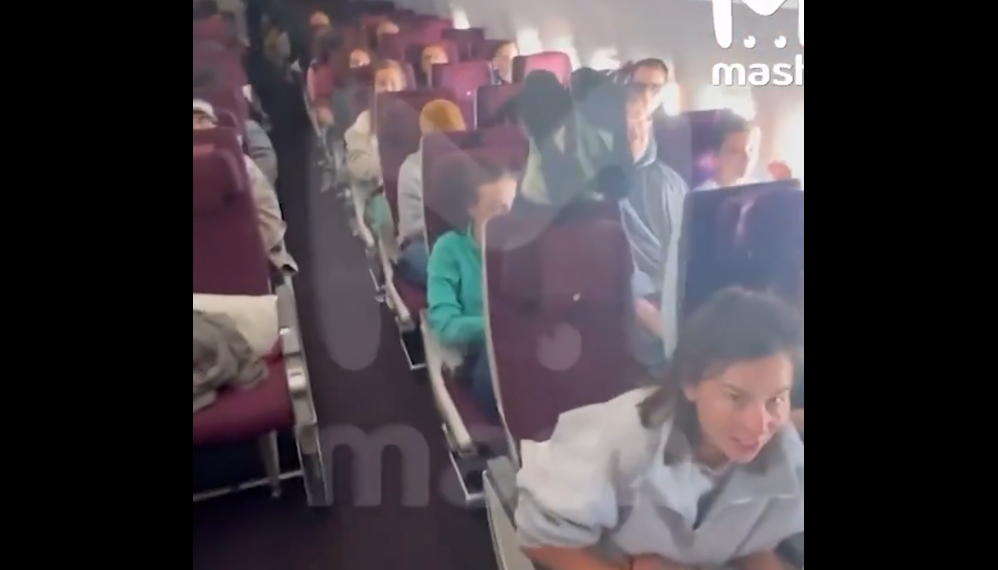 Feet Up at 30,000 Feet: Plane Passenger Sparks Midair Meltdown
