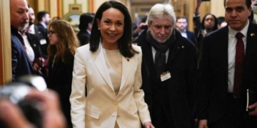 Maria Cornia Machado Gives Trump Gift During White House Visit