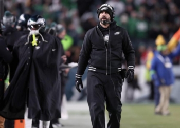 NFL Coach Restrained By Security After Exchange With Player