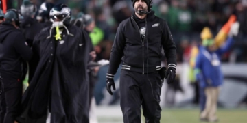 NFL Coach Restrained By Security After Exchange With Player