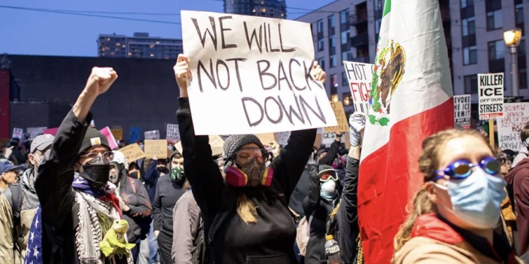 ICE Protesters Create Road Blocks, Demanding ID for Travel