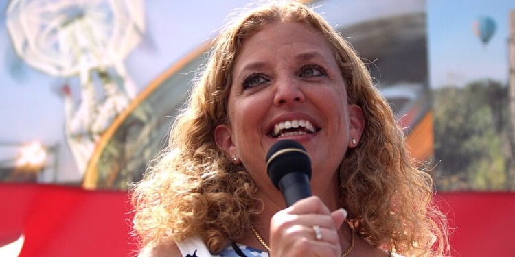 Debbie Wasserman Schultz Announces Run For Mainly Black District With Obama Poster In Background