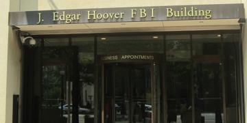 Minnesota Fraud Suspect Jumps From Fourth-Story Balcony To Escape Feds