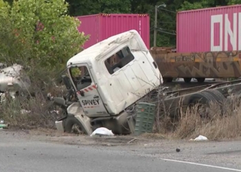 Septic Truck Explodes After Being Struck By Train, Video Shows