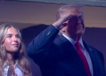 Trump Draws Cheers, Boos at Historic Finals Appearance