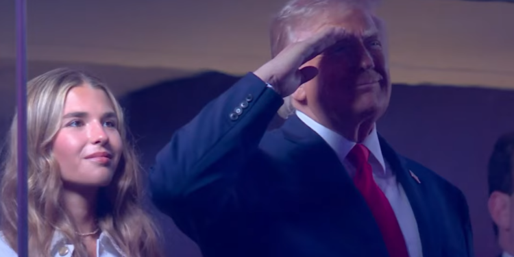 Trump Draws Cheers, Boos at Historic Finals Appearance